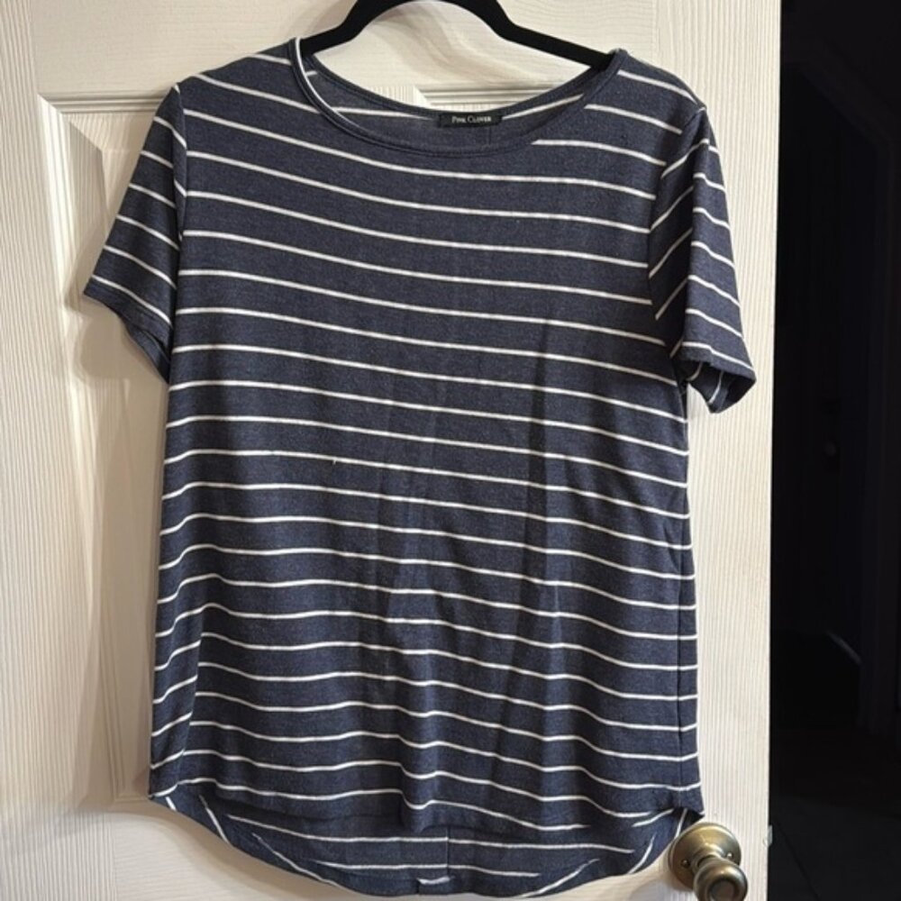 Flowy, soft top with back button detailing. Navy and white stripes.